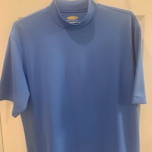 Greg Norman blue shirt